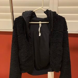 Sold out Reversible Lululemon Fleece Jacket in Black. New, Size 4.